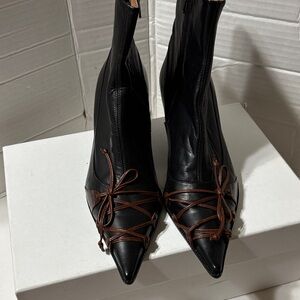 Elegant Black Ankle Boots with Brown Accents